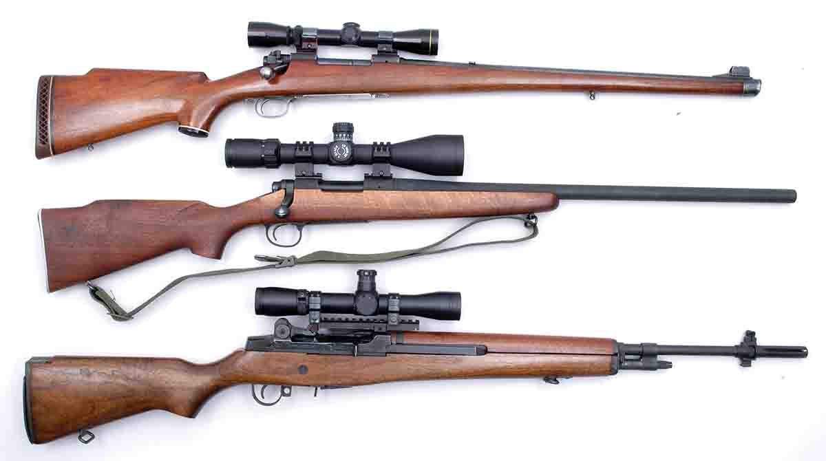Mike’s long-time favorite Model 70 Featherweight .308 Winchester (top) is shown with a couple of other previously owned .308s, including a Remington Model 700V and a Springfield Armory M1A.